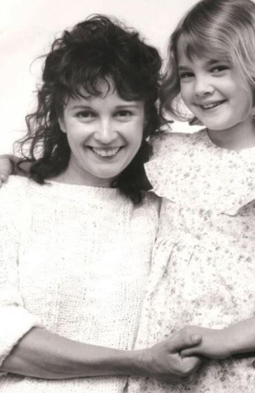 Drew as a child with her mother